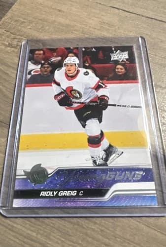 2023-24 Upper Deck Series 1 Hockey Young Guns Ridly Greig Rookie Card #212